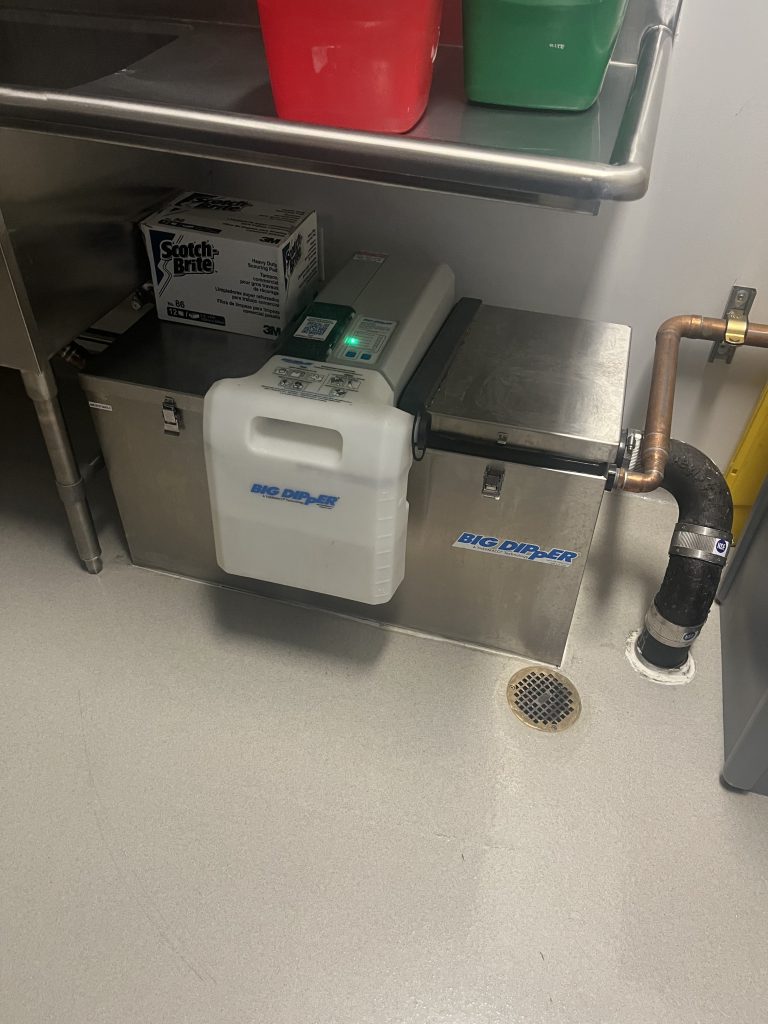 Professional grease trap replacement service for a commercial kitchen