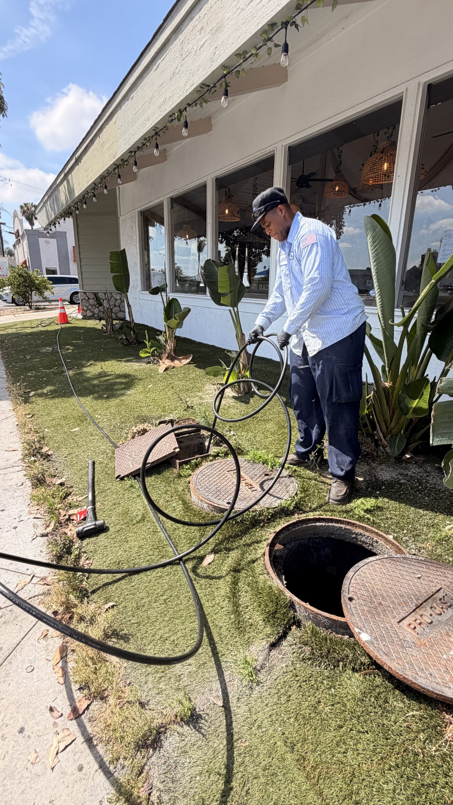 Grease management service performed on an underground grease interceptor at a Los Angeles commercial kitchen